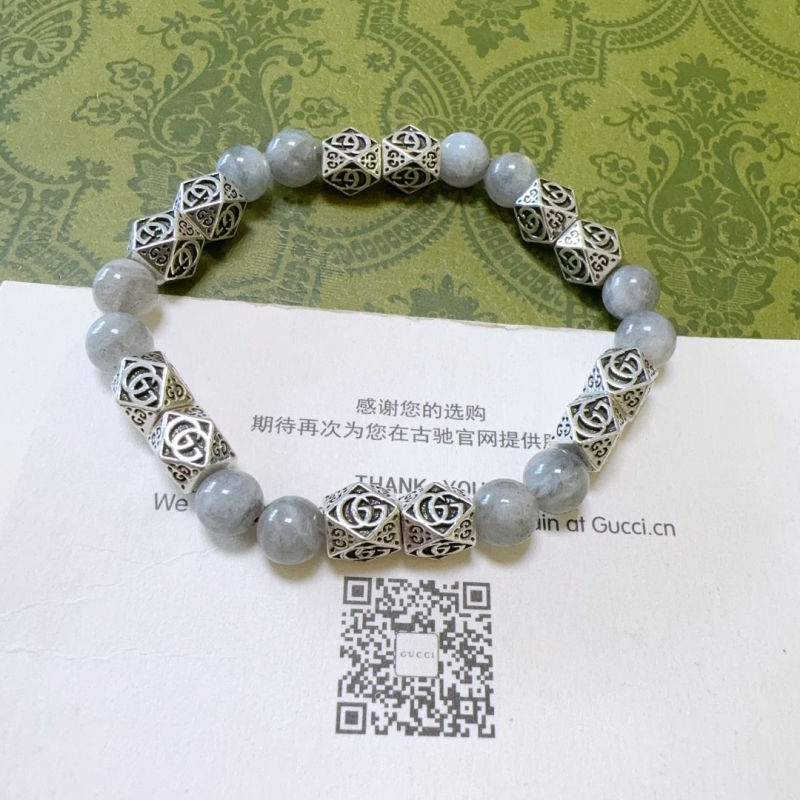 G*u*i bracelets